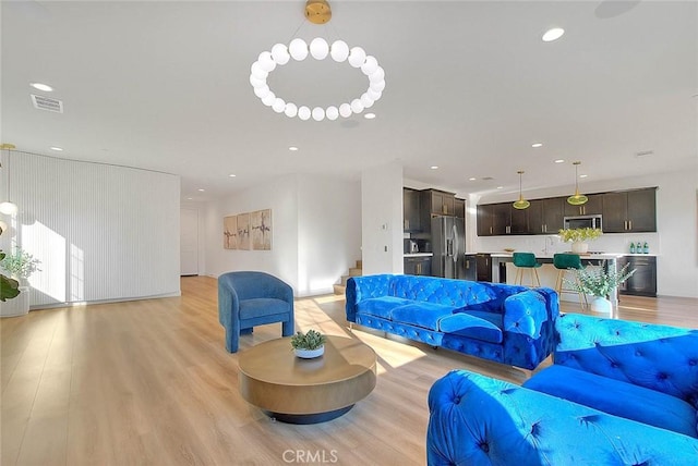 living room featuring light hardwood / wood-style floors