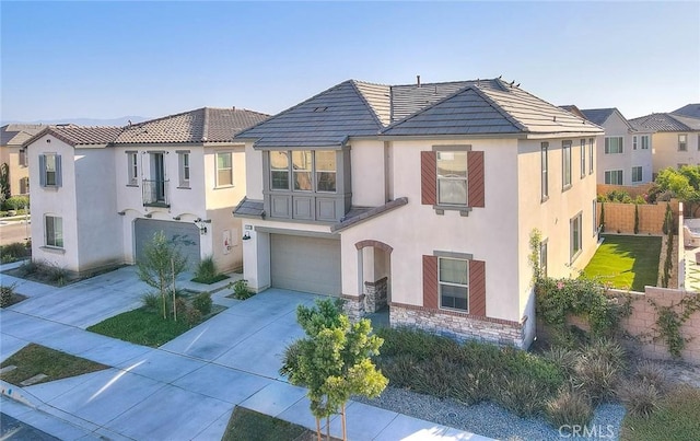 view of front of property featuring a garage