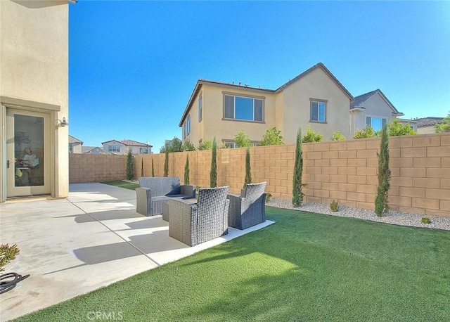 view of yard featuring an outdoor living space and a patio