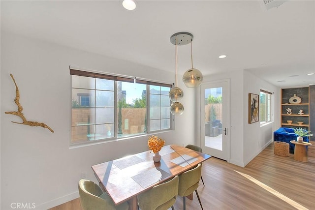 dining area featuring light hardwood / wood-style floors