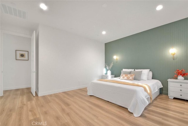 bedroom featuring light wood-type flooring