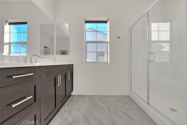 bathroom with vanity and walk in shower