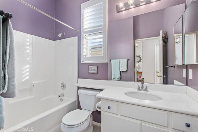 full bathroom with vanity, toilet, and bathing tub / shower combination