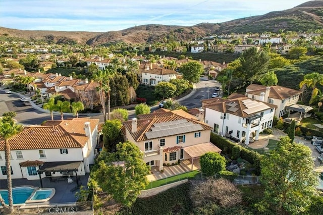 drone / aerial view featuring a mountain view