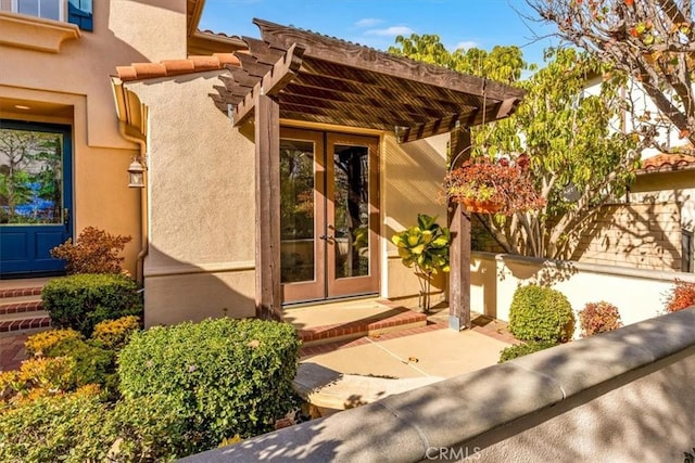 entrance to property with french doors