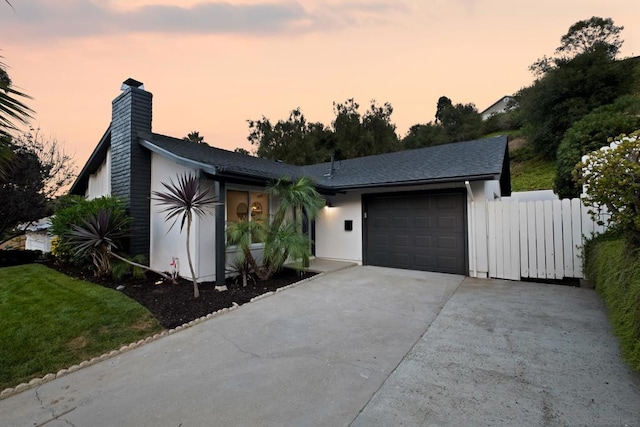 view of front of home with a garage