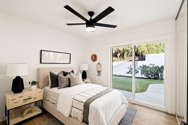 bedroom with light wood-type flooring, access to exterior, and ceiling fan