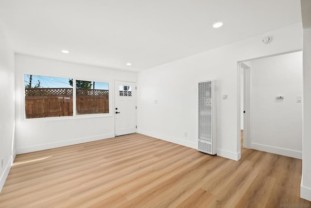 unfurnished room featuring light hardwood / wood-style floors