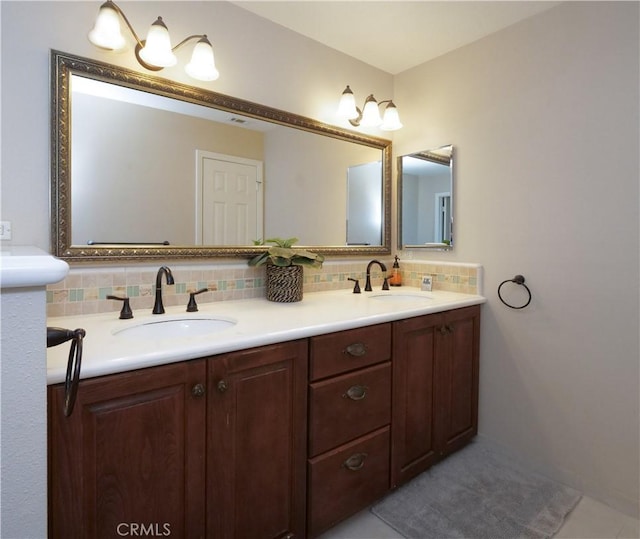 bathroom with vanity and backsplash