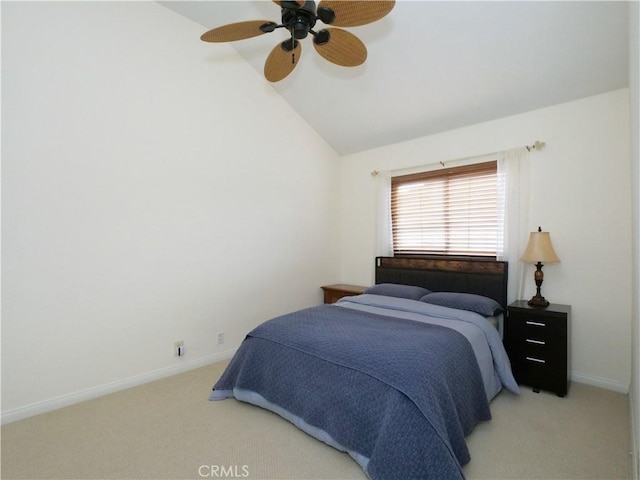 carpeted bedroom with lofted ceiling and ceiling fan