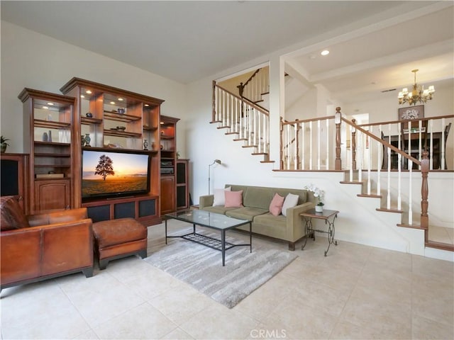 living room featuring an inviting chandelier and light tile patterned floors