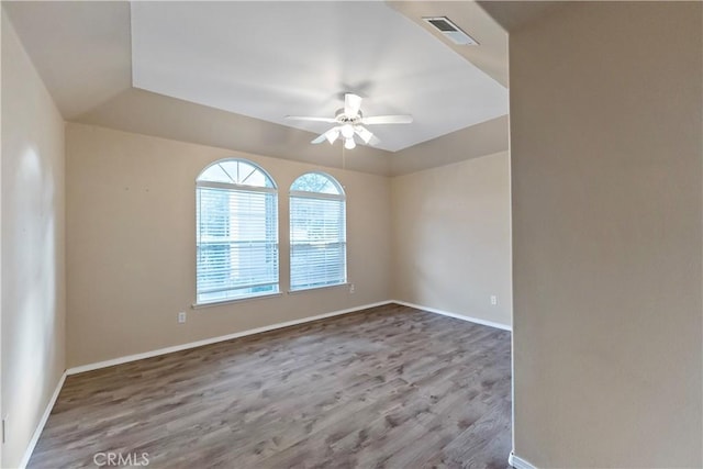 unfurnished room with wood-type flooring and ceiling fan