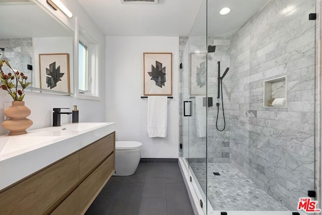 bathroom with walk in shower, vanity, toilet, and tile patterned flooring