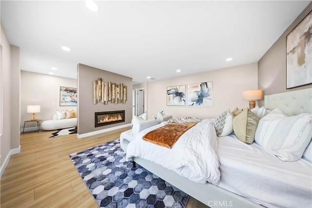 bedroom with wood-type flooring