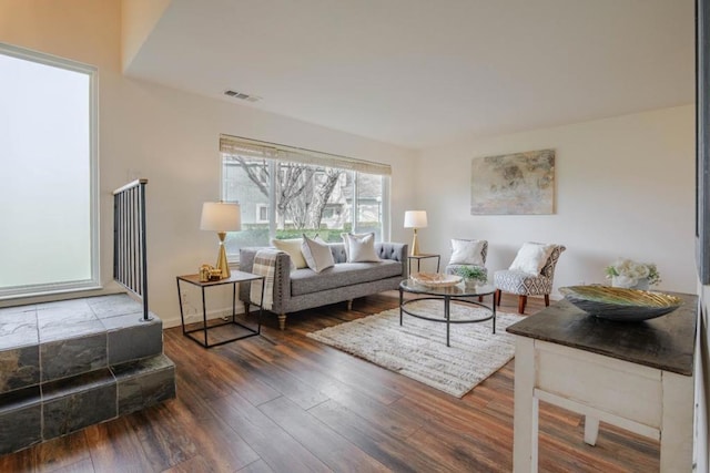 living room featuring dark hardwood / wood-style floors