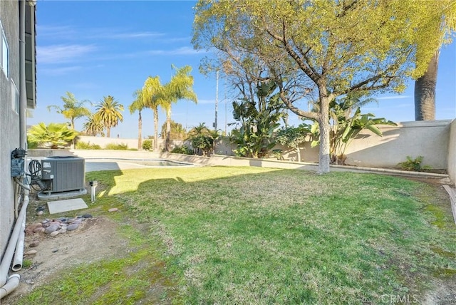 view of yard featuring central AC