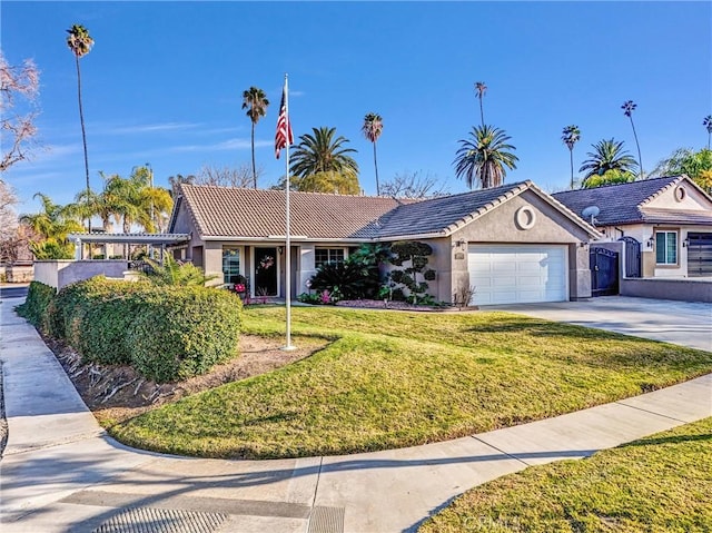 ranch-style home with a garage and a front lawn