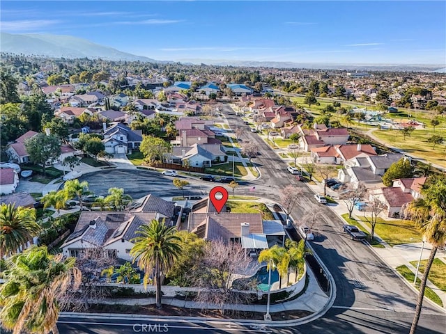 birds eye view of property featuring a mountain view