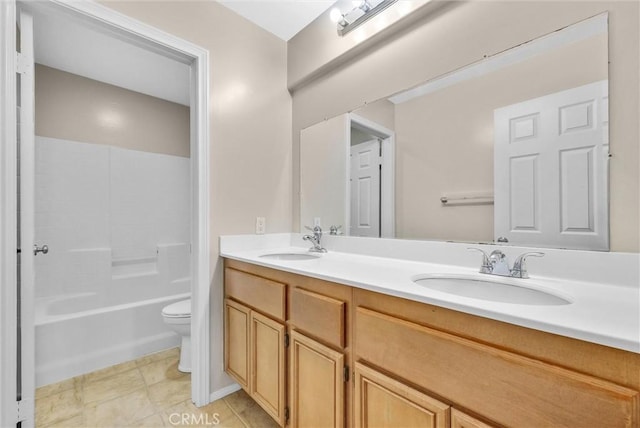 full bathroom featuring vanity, tile patterned floors, shower / bathtub combination, and toilet