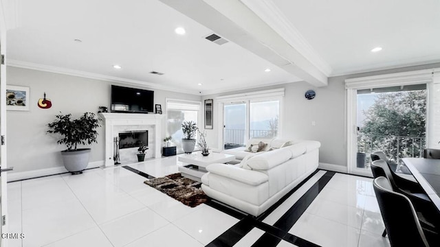 tiled living room with plenty of natural light, ornamental molding, and a premium fireplace