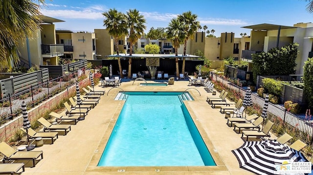 view of pool featuring a patio