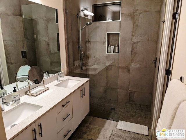 bathroom with vanity and walk in shower