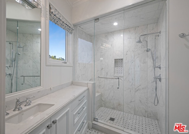 bathroom with vanity and walk in shower