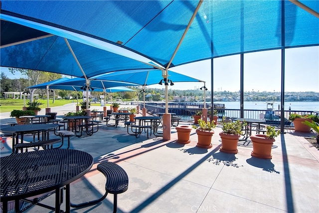 view of patio / terrace featuring a water view