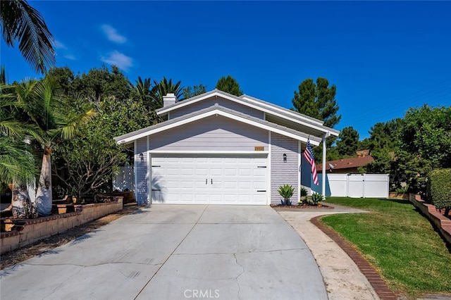 garage with a lawn