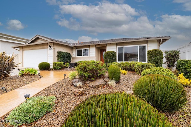 single story home with a garage