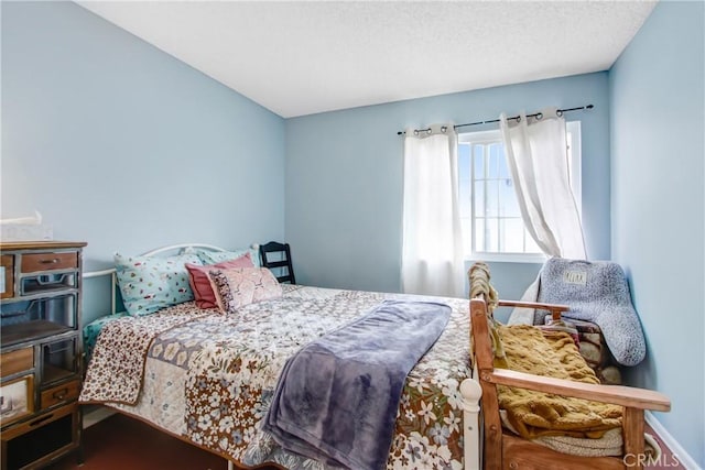 bedroom featuring a textured ceiling