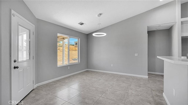 view of tiled empty room