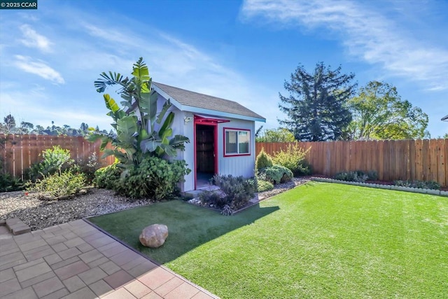 view of outdoor structure featuring a lawn