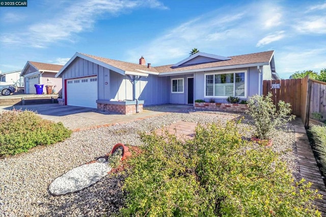 single story home with a garage