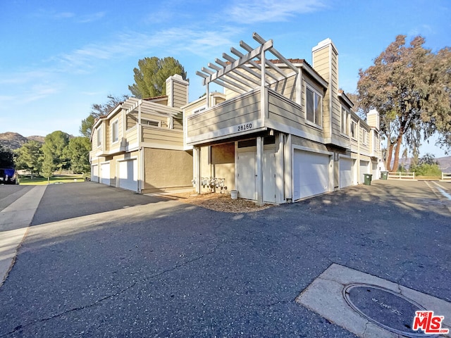 exterior space featuring a garage