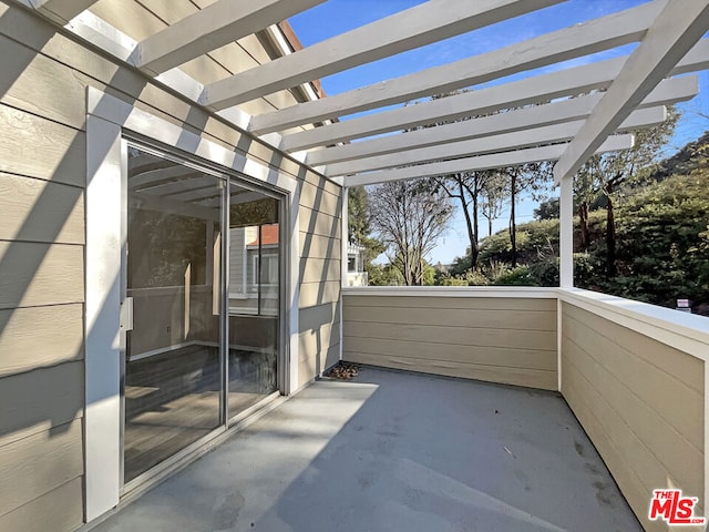 view of patio featuring a pergola