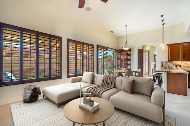 living room featuring ceiling fan