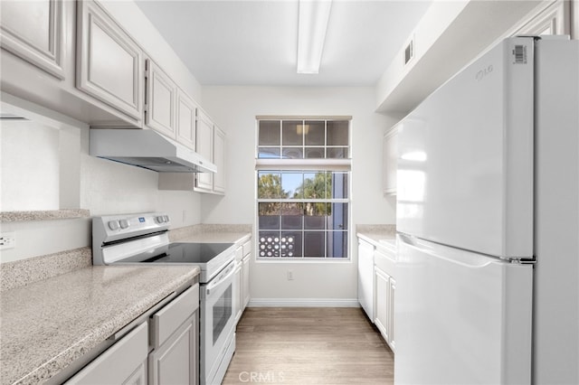 kitchen featuring white cabinetry, white appliances, and light wood-type flooring