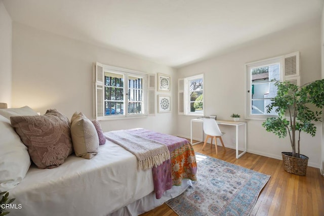 bedroom with light wood-type flooring