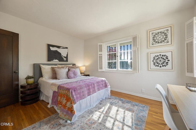 bedroom with light hardwood / wood-style floors