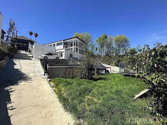 view of yard with a trampoline