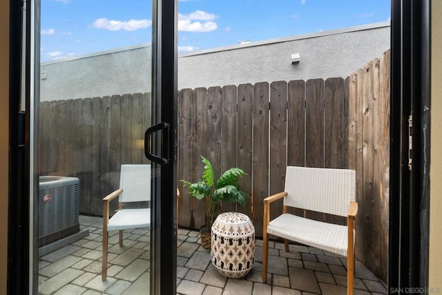 view of patio featuring cooling unit