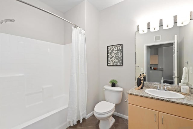 full bathroom featuring tile patterned flooring, vanity, shower / tub combo, and toilet