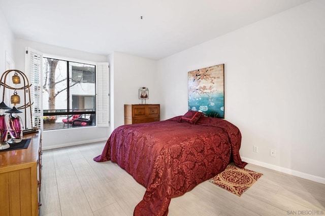 bedroom featuring light wood-type flooring