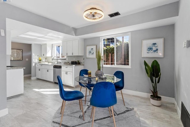 dining space with plenty of natural light