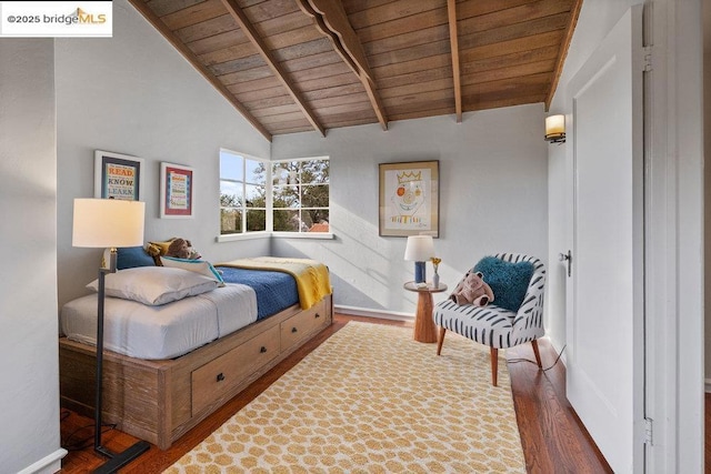 bedroom with lofted ceiling with beams, dark hardwood / wood-style floors, and wooden ceiling