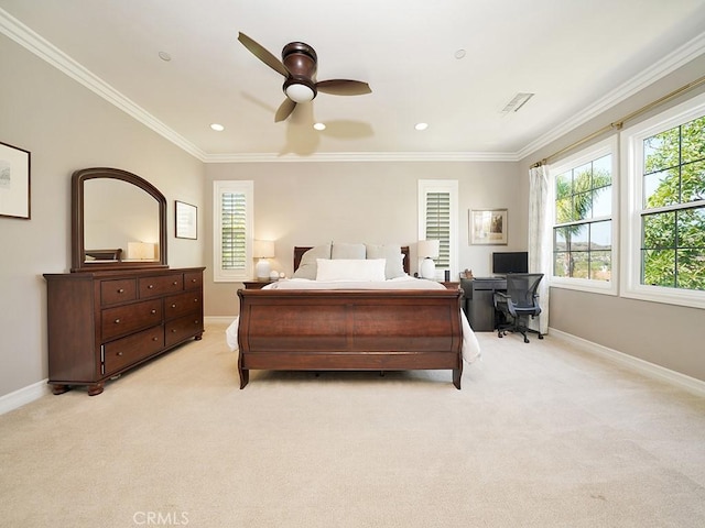 bedroom with crown molding, light colored carpet, and ceiling fan