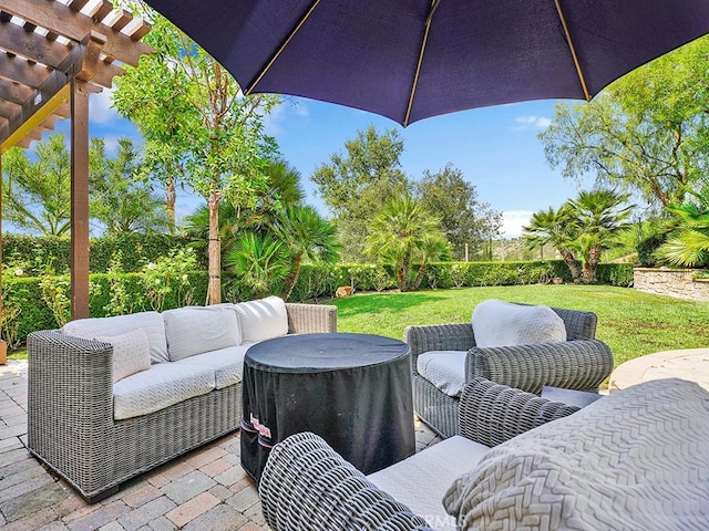 view of patio featuring outdoor lounge area and a pergola