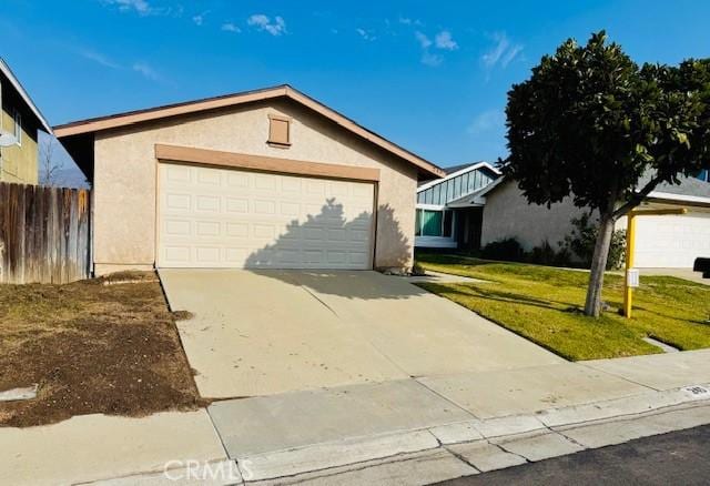 ranch-style home featuring a front yard