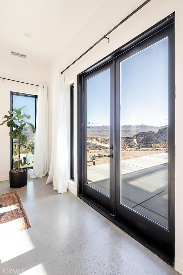 doorway featuring a mountain view